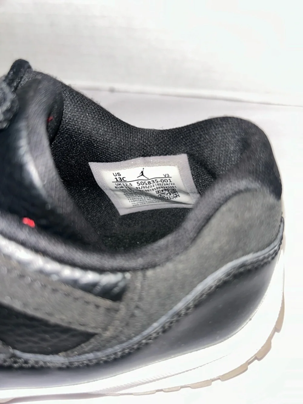 Jordan Kids Black Low-Top Sneakers with Red Logo Accents